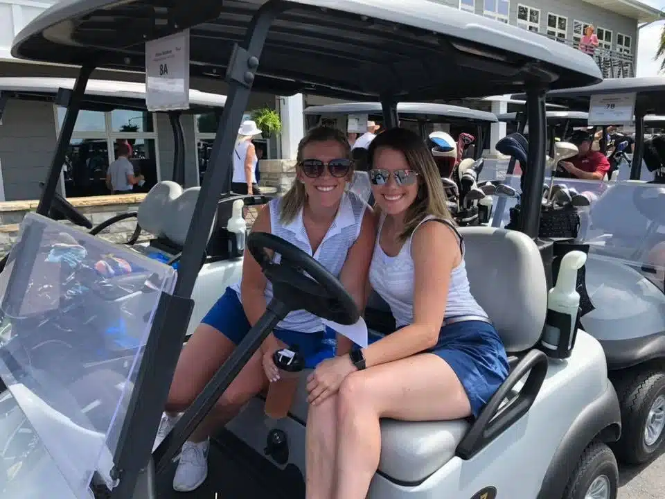 Ladies in a golf cart